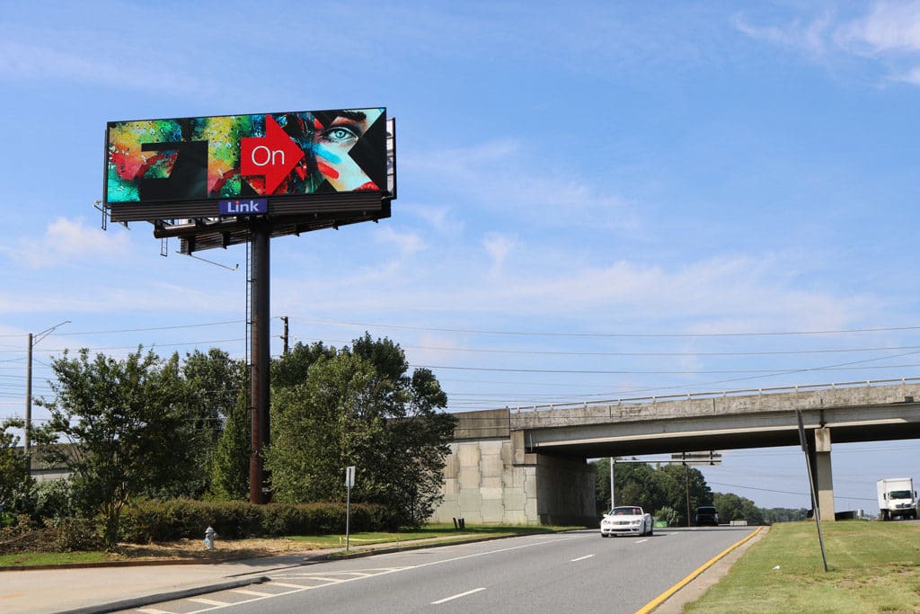 A billboard using Formetco's F360 CMS software with the integration of Adomni Demand Side Platform
