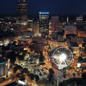 Nighttime view of the Atlanta skyline where Formetco, a digital sign supplier, has installed spectacular signs.