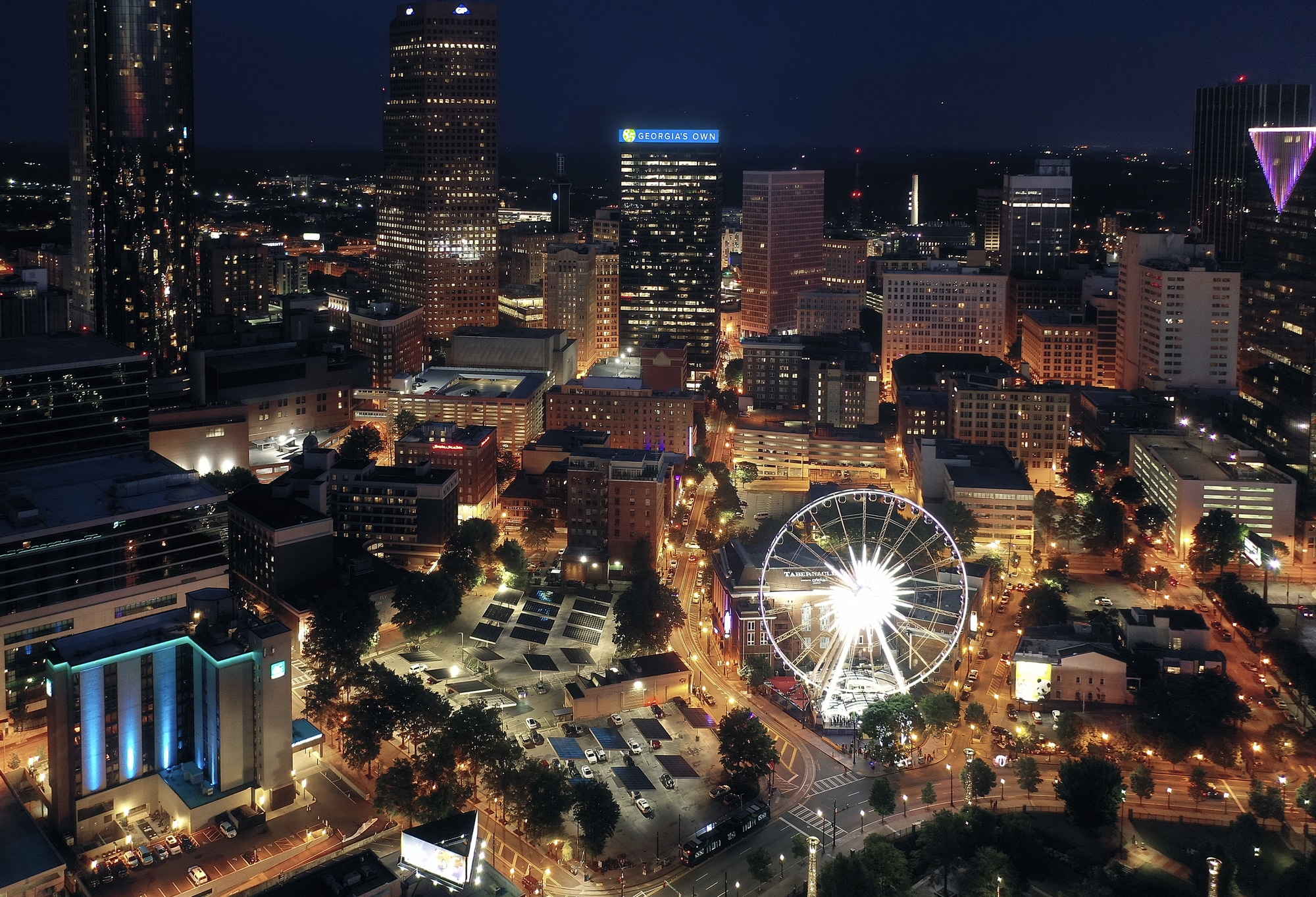 Nighttime view of the Atlanta skyline where Formetco, a digital sign supplier, has installed spectacular signs.